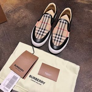 Burberry slip ons gently used size 38 w/tag, authenticity card, dust bag, box